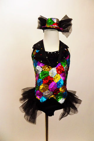 A black satin leotard & attached vest of colourful sequin patches & black satin lapel covered in crystals. Has sparkle tulle bustle & matching sequined top hat. Front
