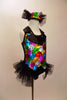 A black satin leotard & attached vest of colourful sequin patches & black satin lapel covered in crystals. Has sparkle tulle bustle & matching sequined top hat. Right side