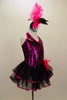 Wavy pattern sequined vest with halter-neck has attached two layered black skirt with fuchsia sequined trim. Comes with hip flower accent & feather hair accessory. Right side