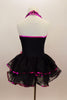 Wavy pattern sequined vest with halter-neck has attached two layered black skirt with fuchsia sequined trim. Comes with hip flower accent & hair accessory.