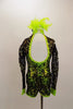 Black sequin stretch lace covers lime biketard with front peep-hole & key-hole back. Has long sleeve lace sleeves with metallic lime cuffs and hair accessory. Back