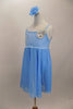 Soft baby blue camisole leotard dress has empire waist with soft blue sheer skirt. Bodice has crystal accents & sequin detail . Comes with hair accessory. Left side