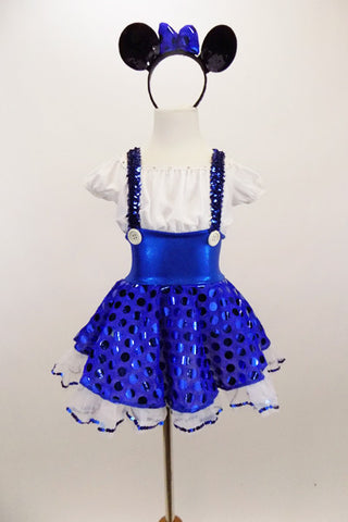 Cap sleeved dress has crystaled blouson bodice, wide waistband, 2  white buttons & suspenders attached to polka dot blue skirt.& white sequined petticoat. Come with mouse ear headband with bow. Front