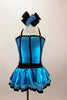 Turquoise metallic halter dress has black vertical piping & waistband with crystals. There is an attached black velvet edged petticoat skirt. Has matching hair accessory. Front