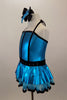 Turquoise metallic halter dress has black vertical piping & waistband with crystals. There is an attached black velvet edged petticoat skirt. Has matching hair accessory.  Left side
