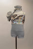 Silver two piece costume has camisole biketard with silver sequined bust Has an attached asymmetrical stretch-satin shrug & separate silver crystal tulle skirt. Comes with hair accessory and white gloves. Front without skirt
