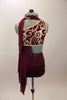 Maroon costume has golden brocade pattern, gold binding and an attached stretch-mesh scarf & asymmetrically draped skirt. Has high-waisted shorts & hair accessory.  Back