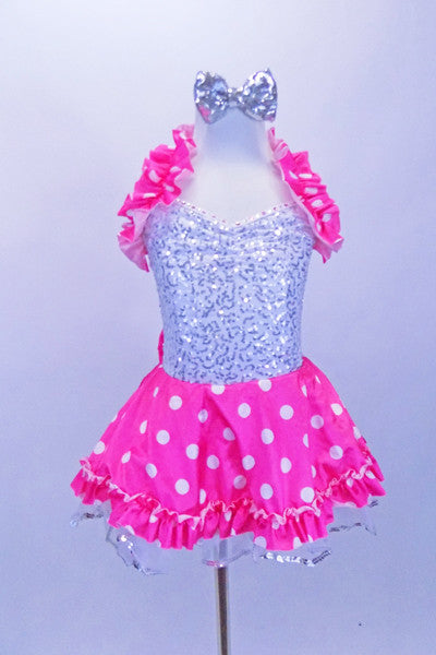 Silver sequined leotard dress has attached skirt with bright pink satin polka dot overlay on white ruffled tricot. Has bow at the back, halter ruffle & hair bow. Front