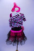 Tank biketard has sparkling black bodice with cerise binding. Attached skirt is black lace & cerise petticoat. Comes with zebra splatter print top & headband. Back