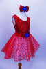 Red tank leotard dress has sequined bodice with large bow with blue star applique, Skirt is layers of white tricot with red polka dot mesh & matching hair piece. Right side