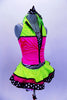 Sequined zebra-print  biketard has separate pink & lime zippered vest. The attached cerise pink & lime layered ruffle skirt has polka dot ribbon accent. Comes with matching hair accessory. Right side