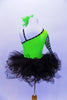Neon green asymmetrical sequined one shoulder leotard with zebra print sleeve and bodice accent. Comes with black tutu skirt and matching feather hair accessory. Back