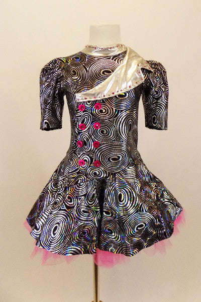 Silver swirl jacket style dress has asymmetrical cross-over front with silver collar & lapel with pink crystals, buttons,pink petticoat & matching newsboy hat. Front