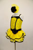 Yellow sequin leotard has black velvet accents with crystals. Black satin rosettes accent the waist & hair accessory. Has ruffle layer skirt with black trim. Left Side