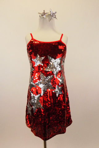 Red sequined camisole tunic dress has silver stars cascading down the front. Comes with separate black bottom & silver stars hair accessory. Front