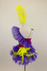 Magenta camisole biketard has crystals & feather accents. Asymmetrical  purple & yellow ruffle crosses the bodice & open front bustle. Has yellow hair feather. Back