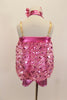 Heart sequin pink blouson top is attached to a metallic pink biketard with metallic yolk & halter straps. Has large sequined bow tie & matching hair accessory. Back