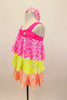 Three tiered, ruffle biketard is neon pink, yellow and orange sequin stretch mesh. The neon pink neckline has a jeweled bow. Comes with sequined hair band. Left Side