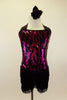 Black and fuchsia sequined dress has vertical swirl pattern. Skirt is triple layered black fringe  Comes with matching fringed gauntlets & hair accessory. Front