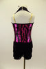 Black and fuchsia sequined dress has vertical swirl pattern. Skirt is triple layered black fringe  Comes with matching fringed gauntlets & hair accessory. Back
