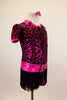 Black based short unitard has zip front, key-hole back & shiny fuchsia pattern print. Has  metallic shorts, fringe skirt, sequined boot covers & hair accessory. Right side