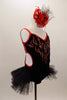 Black velvet leotard dress has hand painted red flames on front bodice. Side open to the back with tulle bustle & the red metallic tie back. Has hair accessory. Right side