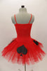 Red tutu dress has Black spade and club accents on skirt and checkered accent at bodice. Comes with matching hair accessory. Back