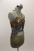 Gold bra top has “V” halter neck strap & attached grey-blue and taupe marbleized kerchief accent attached to bra. Has matching taupe shorts & hair accessory. Right side
