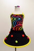 Kaleidoscope coloured swirl camisole leotard is accompanied by a matching pull-on skirt with tubular base, adorned with pom-poms. Has matching  hair accessory. Front