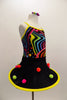 Kaleidoscope coloured swirl camisole leotard is accompanied by a matching pull-on skirt with tubular base, adorned with pom-poms. Has matching  hair accessory. Side
