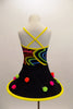 Kaleidoscope coloured swirl camisole leotard is accompanied by a matching pull-on skirt with tubular base, adorned with pom-poms. Has matching  hair accessory. Back
