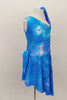 Asymmetrical tank style dress has tie-dye pattern in shade of blues. Sides of the dress are gathered with ties for better fit. Comes with matching hair tie. Side