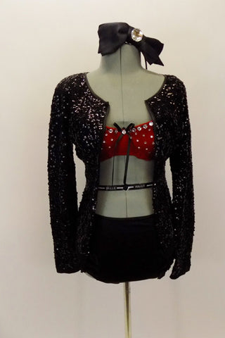 Costume comes with black sequined collarless jacket with leather-like piping. The black brief has ruffles and a red crystalled bra makes the costume pop. Comes with hair accessory. Front