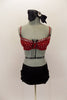 Costume comes with black sequined collarless jacket with leather-like piping. The black brief has ruffles and a red crystalled bra makes the costume pop. Comes with hair accessory. Front no jacket