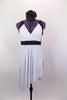 White dress has contrasting black accents at bust, sides & back. Bust crosses over at front and is open at the sides. Comes with hair accessory & black briefs. Front