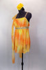 Yellow & orange single shoulder chiffon dress has gold crystals & an empire waist with gathered chiffon shoulder. Comes with gold beaded belt & floral hair accessory. Left side