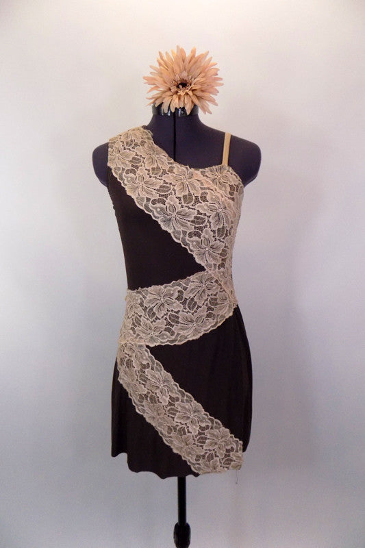 Brown one-shoulder stretch dress has built in brown briefs. Taupe band of wide lace accents the dress is a large zig-zag pattern  Comes with floral hair accessory. Front