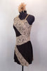Brown one-shoulder stretch dress has built in brown briefs. Taupe band of wide lace accents the dress is a large zig-zag pattern  Comes with floral hair accessory. Left side