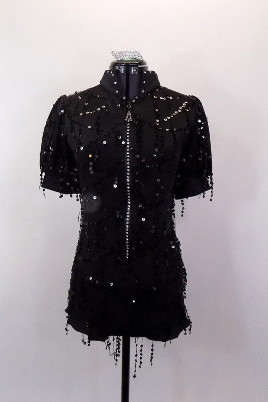 Black front zip leotard has crystal zipper, open back and collar with Swarovski crystals. The entire costume is covered with dangling black sequin strands. Comes with matching hair accessory. Front