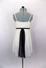 Ivory knee length chiffon dress has empire waist with gathered pleat bust. Has black velvet piping with amber crystals and long black center kerchief accent. Comes with hair accessory. Back