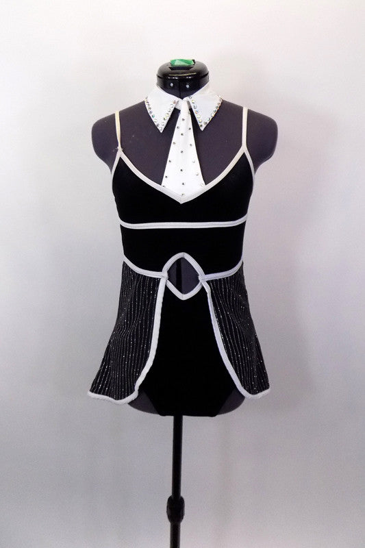 Black velvet camisole leotard has empire waist, white piping with open front tailcoat pin-stripe bustle & white crystaled faux tie. Comes with black hat.  Front