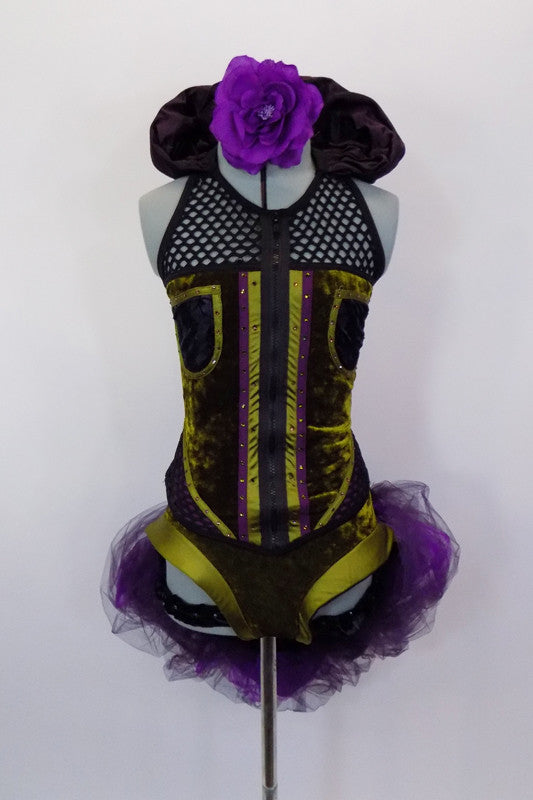 Costume has olive velvet vest-top with mesh halter neck & plum satin Elizabethan collar. Matching high-leg brief has elastic ruffle & plum bustle with black & purple tulle & green bow. Comes with purple floral hair accessory. Front