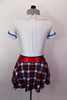 White schoolgirl style kilt dress has neck-tie collar, red crystal accent belt, blue piping & large crystal-jeweled buttons.Comes with bow hair accessory. Back