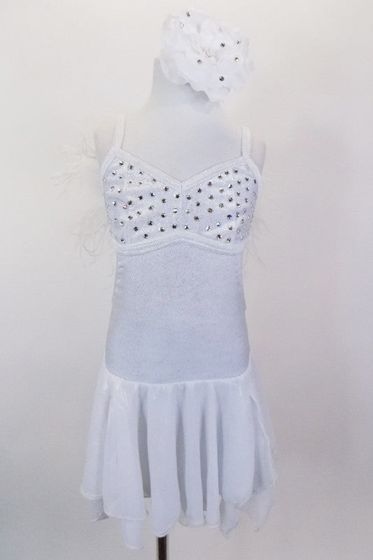 White sparkle leotard dress has layered chiffon skirt & crystal covered bust area. Shoulders are lined with white down feathers.  Comes with hair accessory. Front