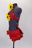 Two piece red costume has beaded triangle bra-top with large center sunflower. Ruffled brief has crystaled waistband & large back bow. Has sunflower hair piece. Left side
