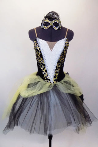 Romantic tutu has black velvet bodice with gold swirls, white inlay with crystals & gold braiding. Skirt is black-white base with pale yellow tulle overlay. Comes with matching mask and feather fan. Front