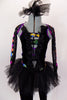 Black velvet unitard has black tutu skirt. Legs and sheer arms have colorful design lined with crystals. Bodice had low V-front held by straps & ruffled collar. Comes with hair accessory. Front zoomed