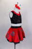 Ladybug themed costume has red skirt with large crystaled blue dots over layers of black lace petticoat. Comes with black sequin top & matching hair accessory. Right side