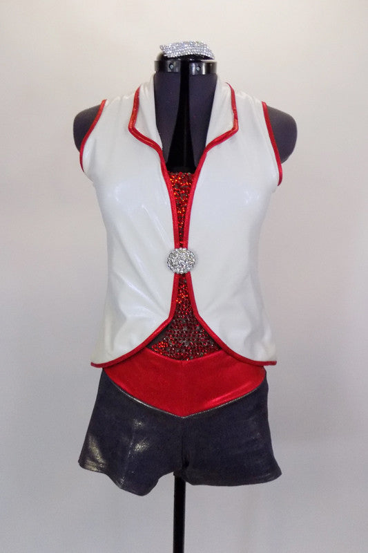 Shimmery white vest top with red piping & large crystal button covers attached nude sheer mesh leotard covered in red crystals. Comes with metallic denim shorts. Has crystal hair barrette. Front