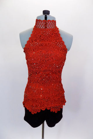 Burnt orange crochet lace halter top ties at neck & has attached camisole lining covered in Swarovski crystals. Comes with maroon velvet shorts & chiffon shawl. Front